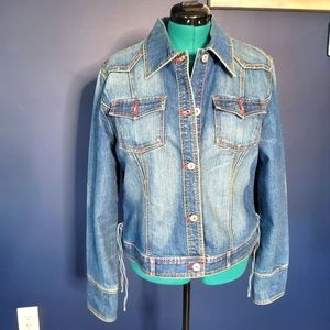 Denim jacket with red stone